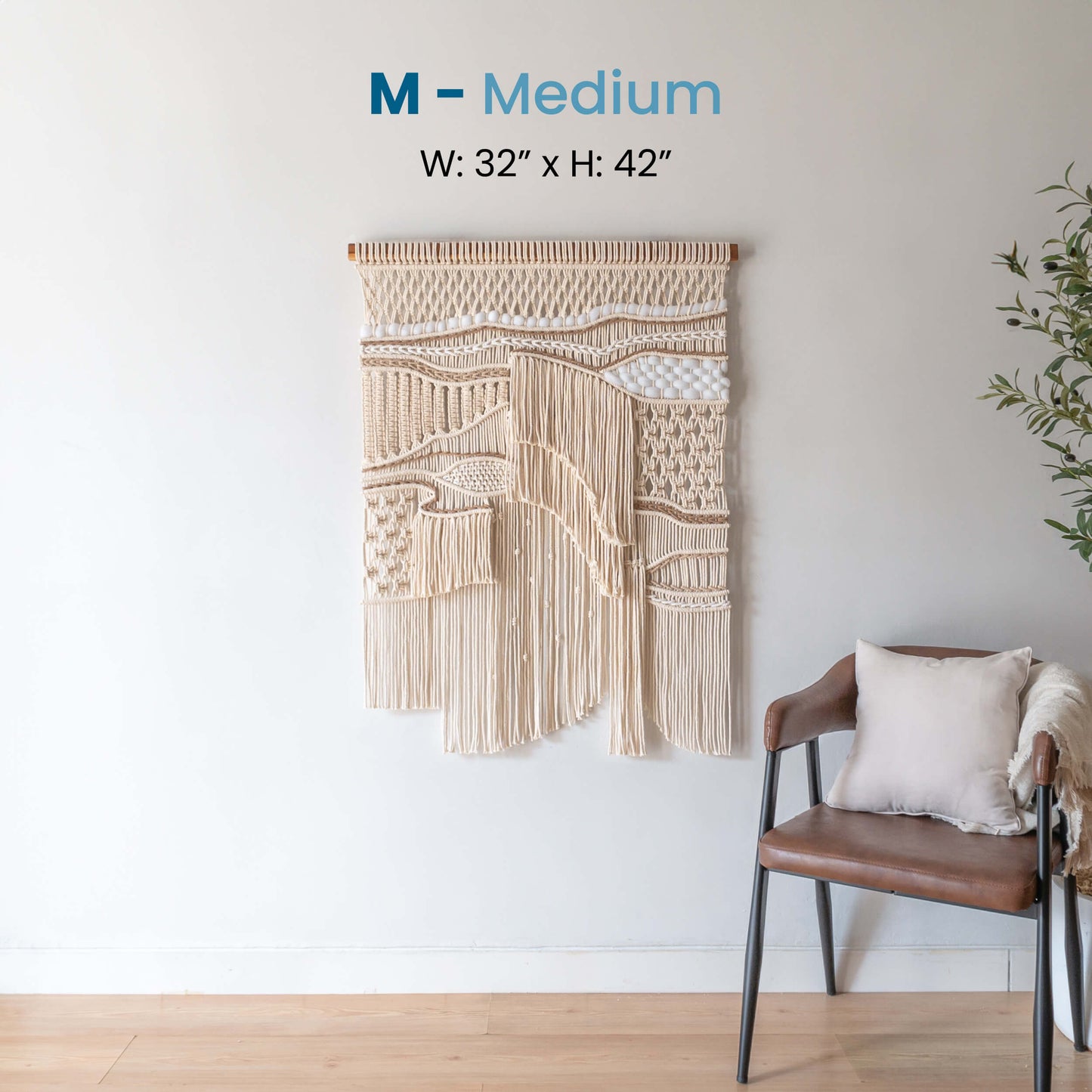 Medium ASAH macrame wall hanging, 32 inches wide by 42 inches tall, showcasing soft textures and intricate knots, perfect for adding elegance to any room